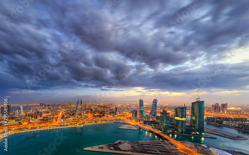 Aerial view of architecture and newly constructed areas with beautiful clouds  in Manama, Bahrain