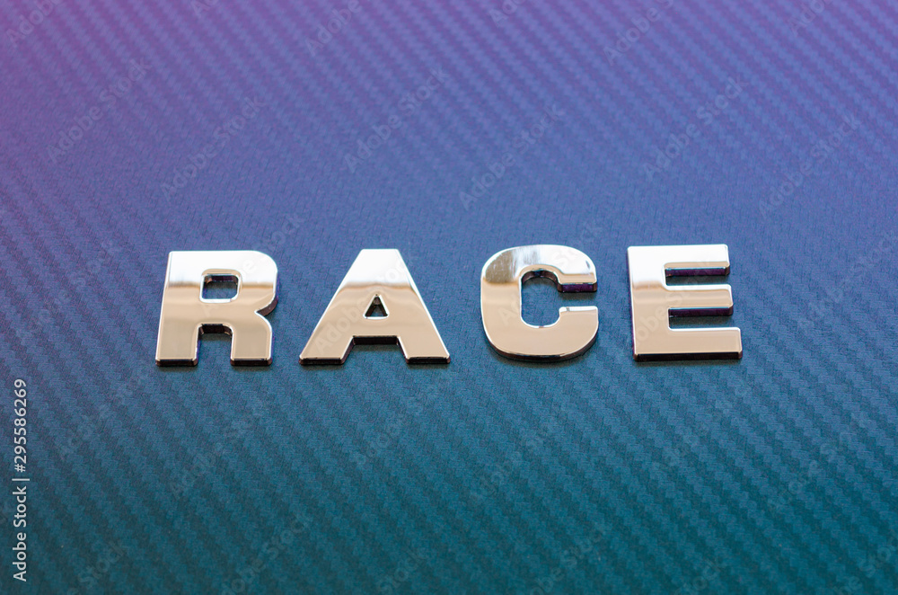 Obraz premium Concept of sport, speed, racing. Letters on carbon fiber background placed diagonally