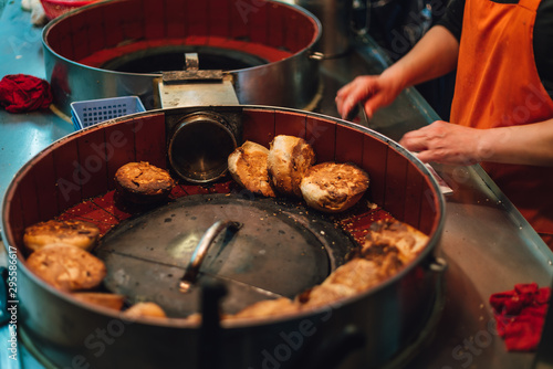 Canvas Print Sheng Jian Bao: Fried white pork bun topping with sesame