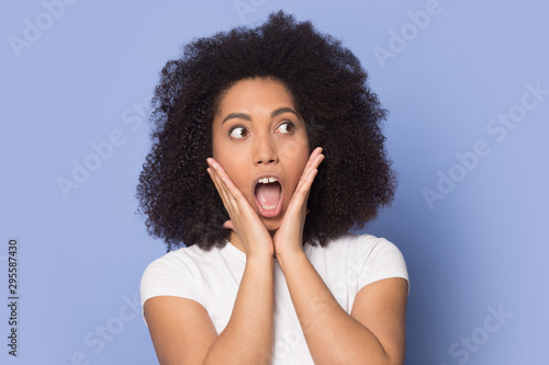Shocked african American girl stunned by amazing sale deal
