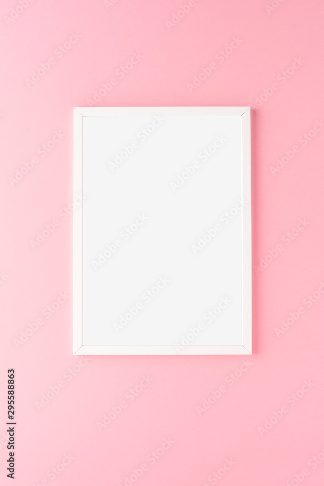 Empty picture frame on pink wall. Mockup with copyspace Empty picture frame on pink wall. Mockup with copyspace