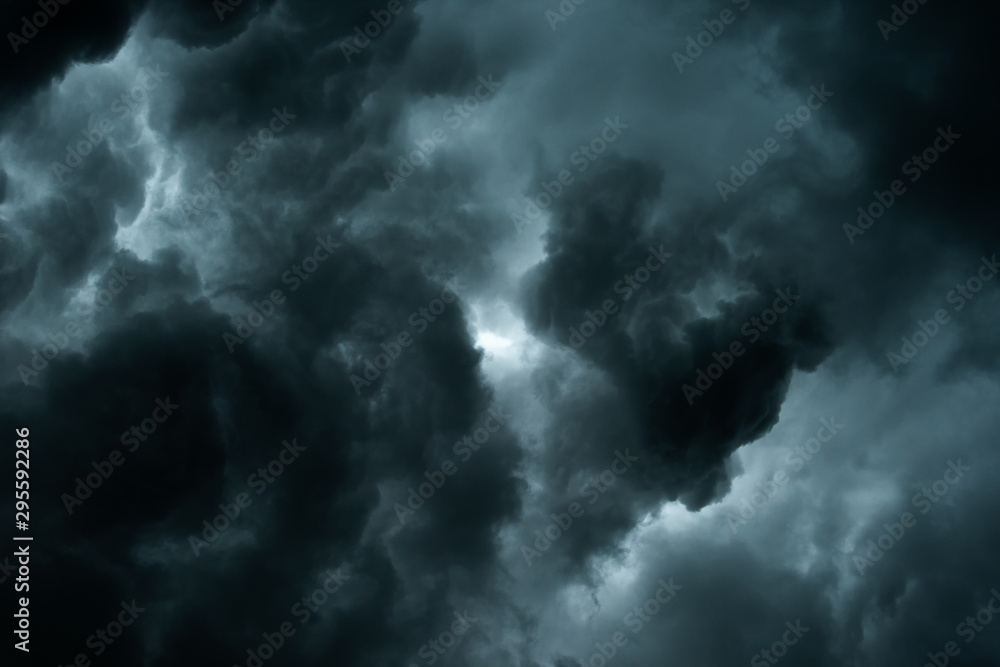 Storm clouds dramatic with black clouds and moody sky, Motion dark sky before rainy - obrazy, fototapety, plakaty 