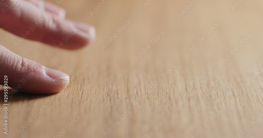 man hand touch oil finished oak wood surface man hand touch oil finished oak wood surface