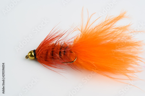 orange brass gold head trout and salmon fishing lure