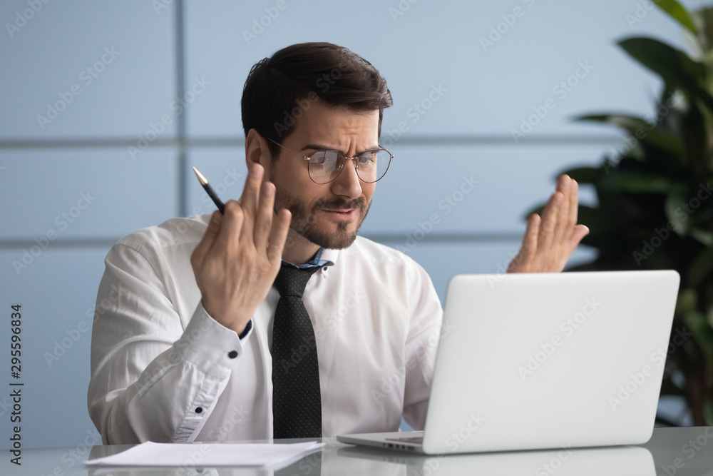 Angry manager irritated by poor internet connection. Angry manager irritated by poor internet connection.