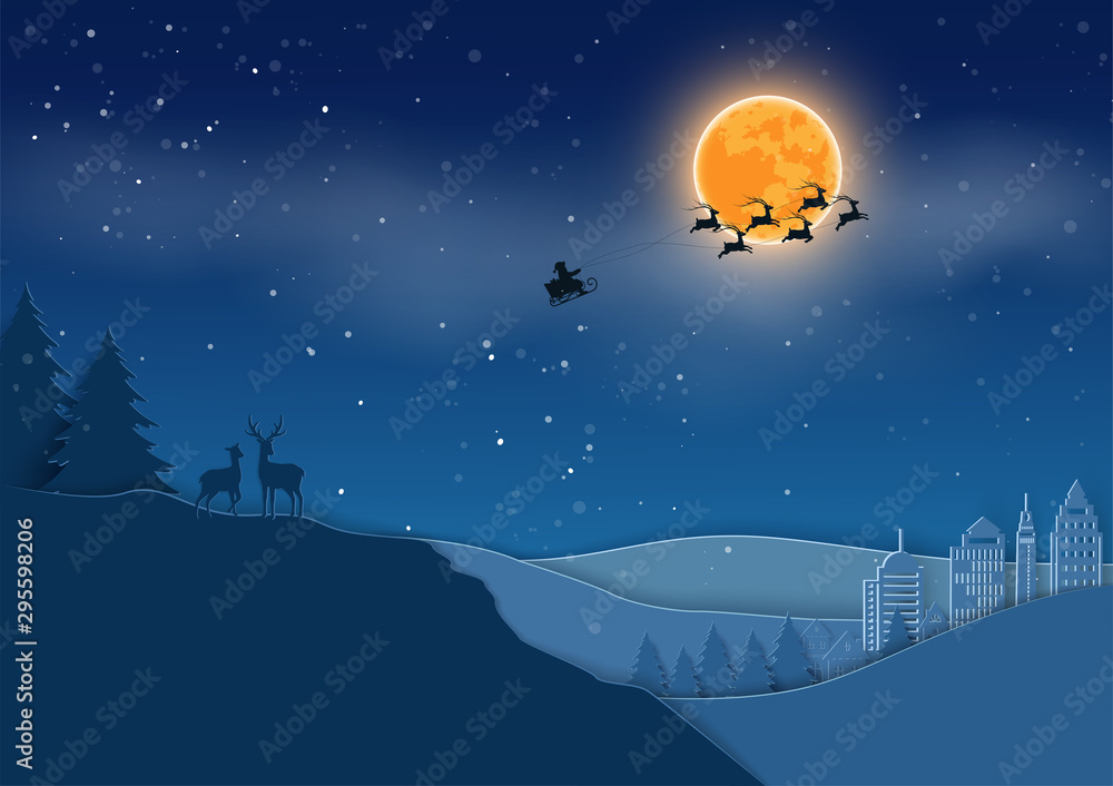 Naklejka premium Paper art deer family on monotone blue landscape background,Santa Claus coming to the city on winter night