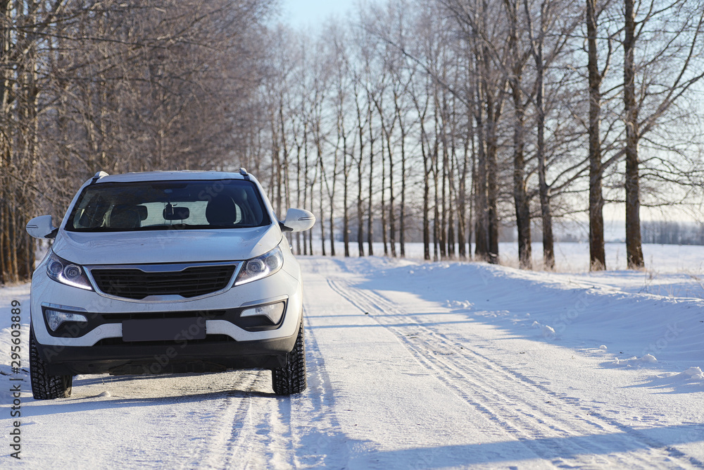 Car on a winter snow road Car on a winter snow road