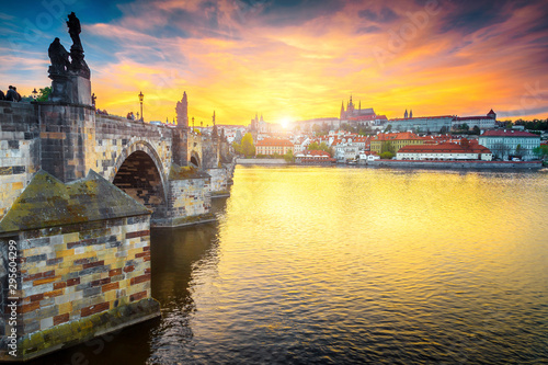 Obraz na plátne Medieval pedestrian stone Charles bridge at sunset, Prague, Czech Republic