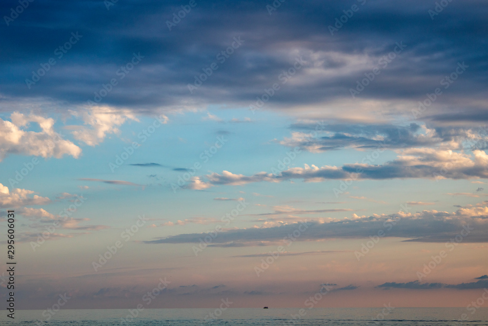 Black Sea on a warm summer evening with a boat on the horizon