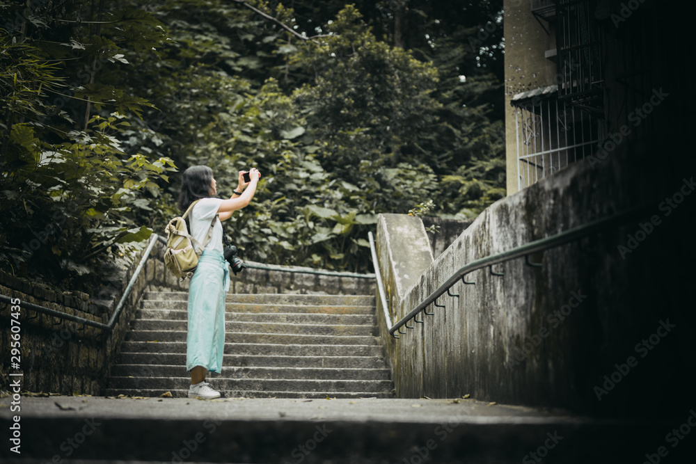 Obraz premium Asian women with camera Traveling in Macau.