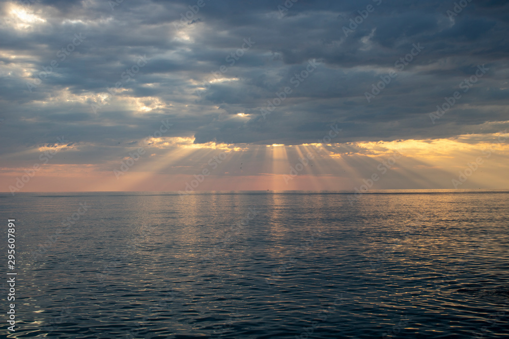 Black Sea on a warm summer evening with boats on the horizon Black Sea on a warm summer evening with boats on the horizon