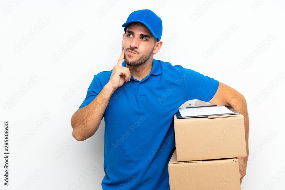 Delivery man over isolated white background thinking an idea Delivery man over isolated white background thinking an idea