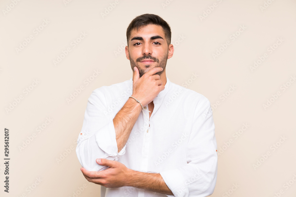 Handsome man with beard over isolated background laughing Handsome man with beard over isolated background laughing