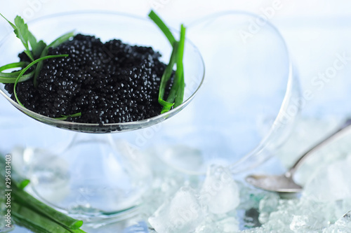 Fresh black fish roe. Beluga caviar served with ice.