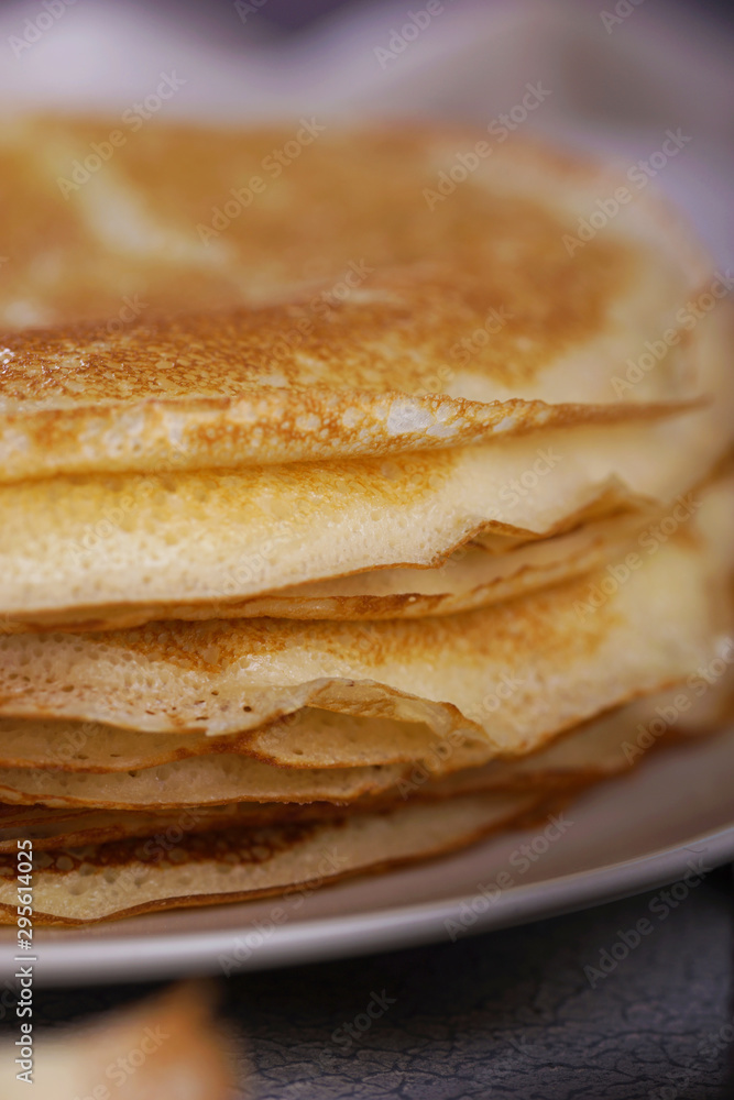 Breakfast with pancakes on a textured background Breakfast with pancakes on a textured background