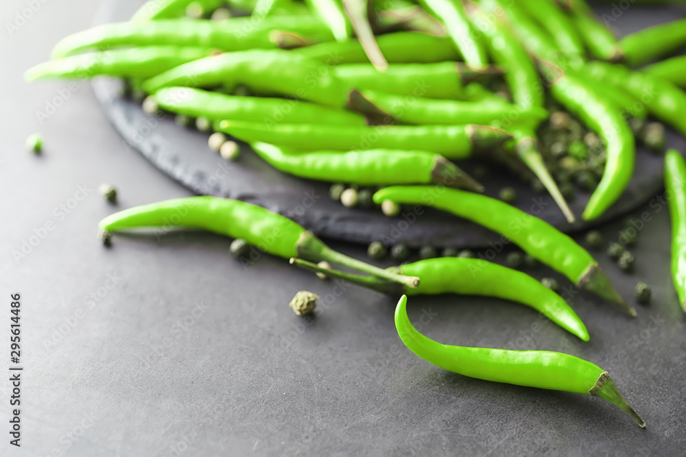 Hot green pepper. Chilean pepper on a black. Hot green pepper. Chilean pepper on a black.
