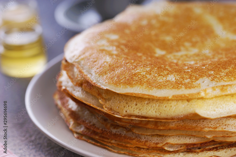 Breakfast with pancakes on a textured background Breakfast with pancakes on a textured background