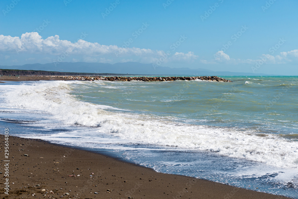 Beautiful sea and the black sandy beach,