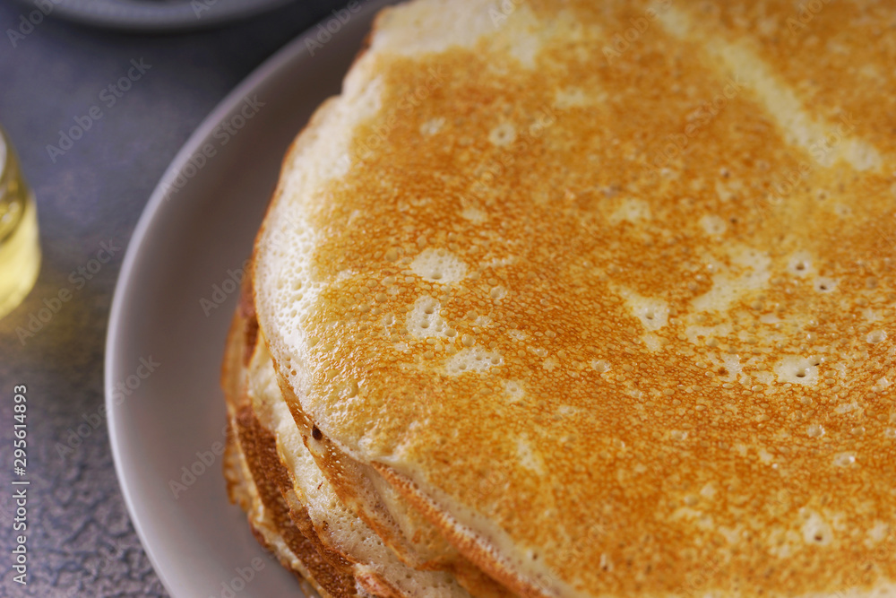 Breakfast with pancakes on a textured background Breakfast with pancakes on a textured background