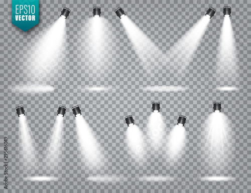 Vector spotlight set. Bright light beam. Transparent realistic effect. Stage lighting. Illuminated studio spotlights.