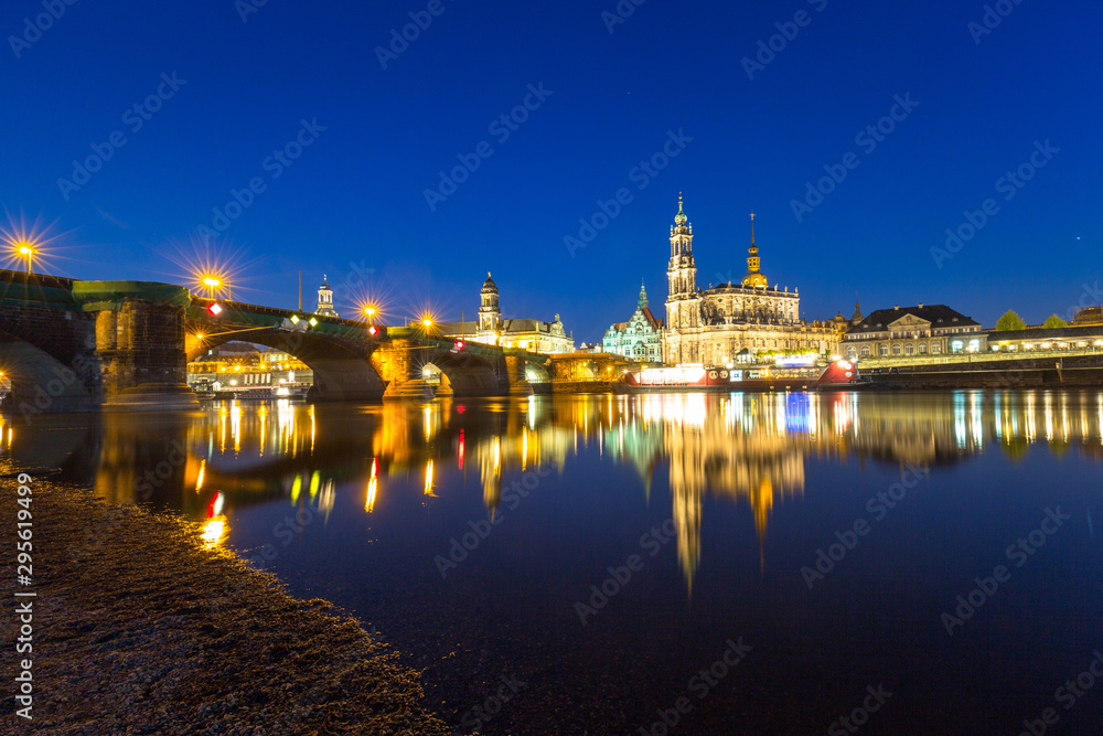 Cityscape of Dresden at Elbe River and Augustus Bridge at night, Saxony. Germany