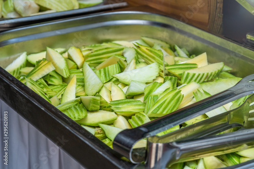 Close Up Of Cucumber Slices Inside A Foodservice Hotel Pan