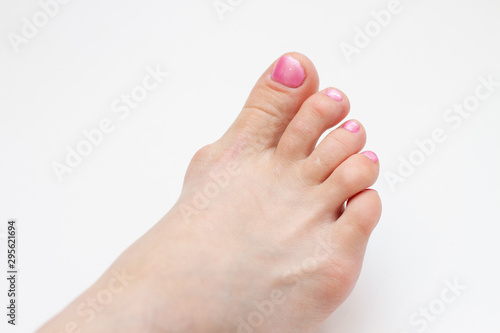Foot with pedicure. Female leg on a white background