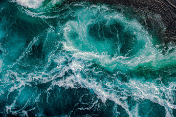 Waves of water of the river and the sea meet each other during high tide and low tide.