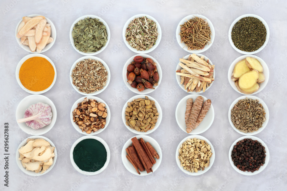 Asthma and respiratory relieving herbs, spice and supplement powders used in natural and chinese herbal medicine in porcelain bowls. Flat lay. Asthma and respiratory relieving herbs, spice and supplement powders used in natural and chinese herbal medicine in porcelain bowls. Flat lay.