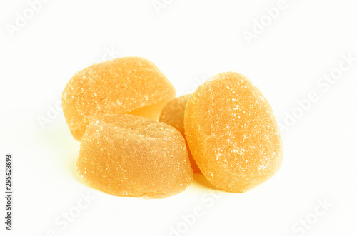Isolated yellow marmalade on the white background.