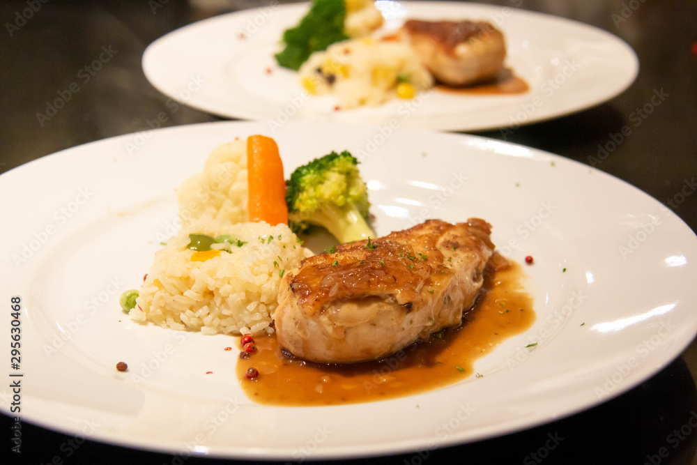 A chicken steak on plate A chicken steak on plate