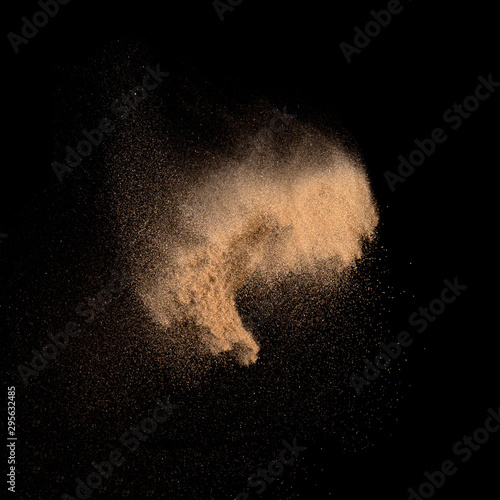 Sand, isolated on black background.