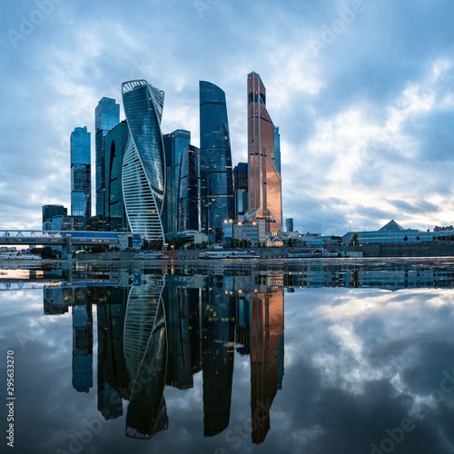 Moscow. Russia. Reflection of skyscrapers in the water of the Moscow river. Moskva-city. High-rise buildings in the center of the capital of the Russia. Modern architecture. Gray urban landscape