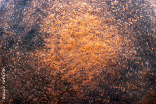 Old rusty grunge orange metal copper texture background.