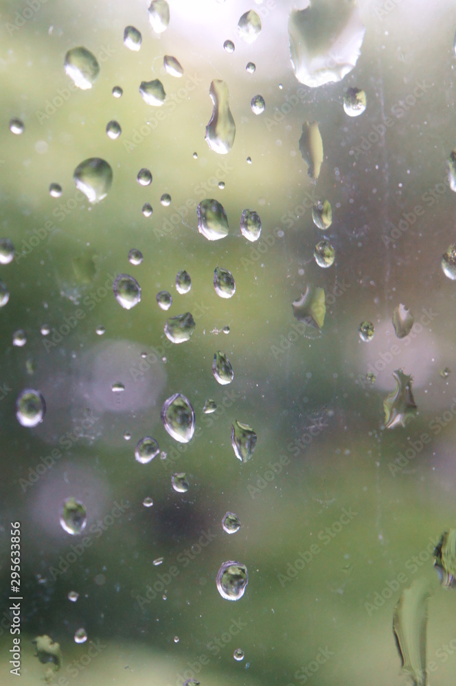 Water drop on window in rainy day