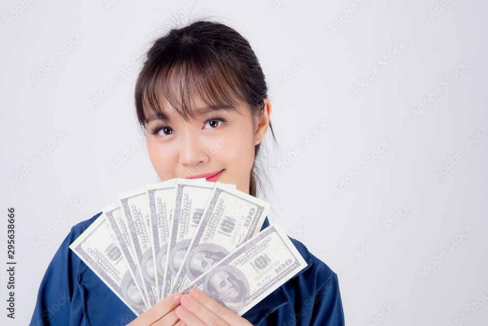 Beautiful portrait young business asian woman holding money isolated on white background, businesswoman showing banknotes with excited, happy girl income with profit finance and success concept. Beautiful portrait young business asian woman holding money isolated on white background, businesswoman showing banknotes with excited, happy girl income with profit finance and success concept.