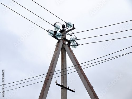 A power line and white sky.