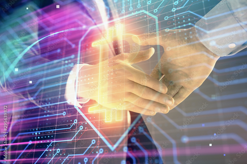 Multi exposure of bitcoin sign on abstract background with two men handshake. Concept of cryptocurrency Multi exposure of bitcoin sign on abstract background with two men handshake. Concept of cryptocurrency
