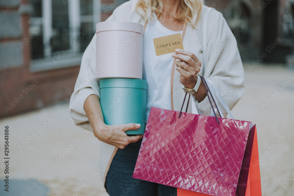 Female with bags and a credit card