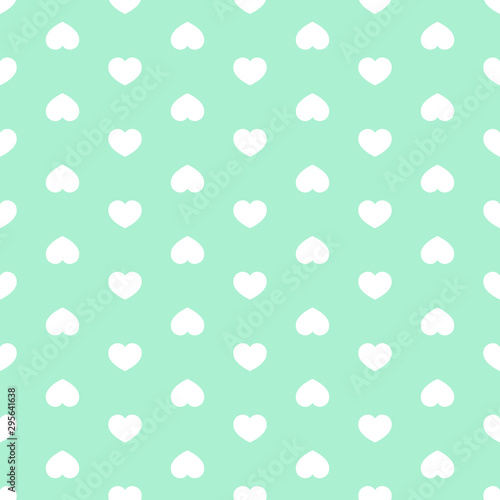 White heart arranged in a line on a green mint background. Cute hearts arranged alternately. Seamless vector pattern. Endless illustration.