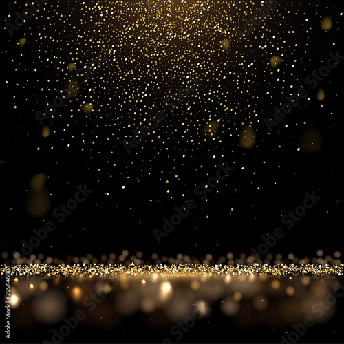 Gold glitter and shiny golden rain on black background. Vector square luxury background. photo