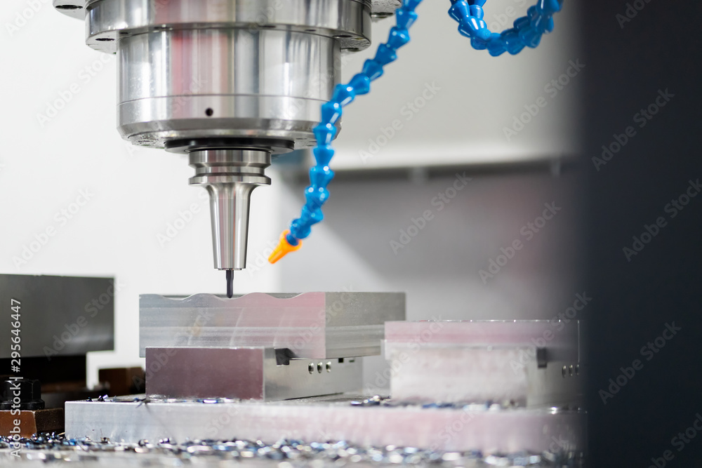 High precision CNC machining center working, operator machining automotive sample part process in the factory High precision CNC machining center working, operator machining automotive sample part process in the factory