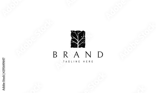 Vector logo on which an abstract image of a tree.