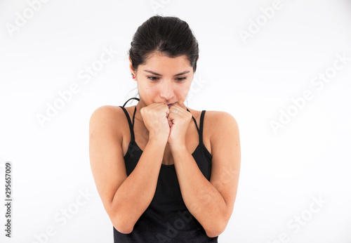 Fear emotional girl on a light background photo