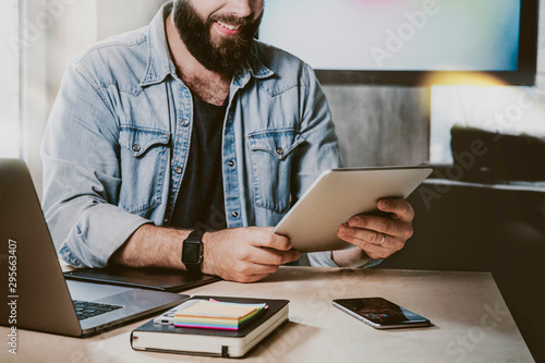 Digital developer testing app on gadgets. Office manager using tablet, laptop and smartphone for work. Businessman checking email.