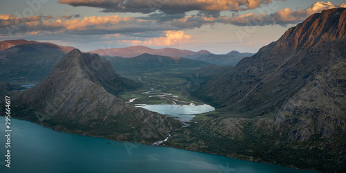 Sunset light over mountains and valleys in the Jotunheimen national park photo