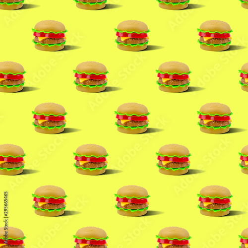 fast food pattern plastic burger on a yellow background