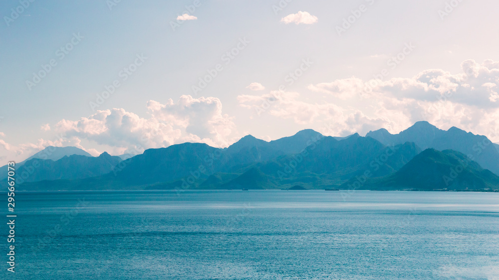 Mountains view from the sea shore of Antalya - one of the most popular resorts of Turkey. Photo 16:9.