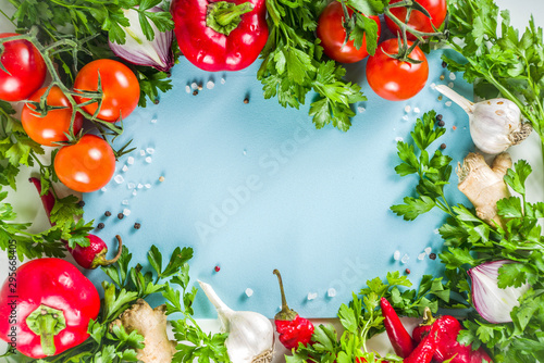 Cooking background with fresh vegetables and herbs