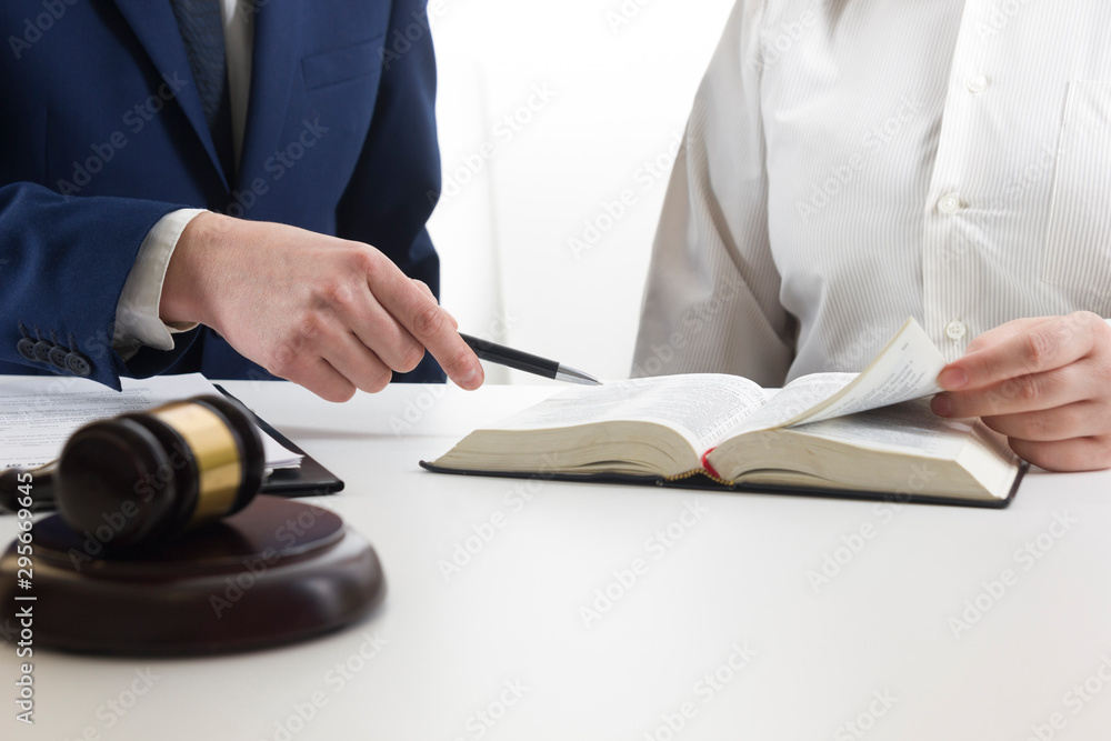 Law, advice and Legal services concept. Lawyer and attorney having team meeting at law firm. Law, advice and Legal services concept. Lawyer and attorney having team meeting at law firm.